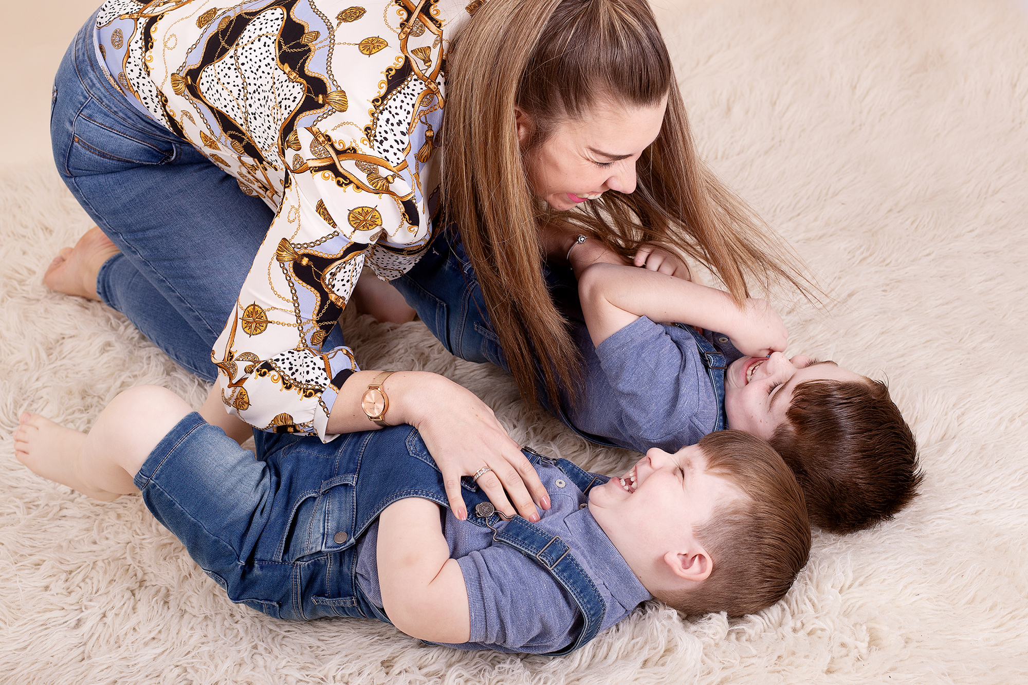 mum tickling her 2 boys during a mummy and me photo session in Kent