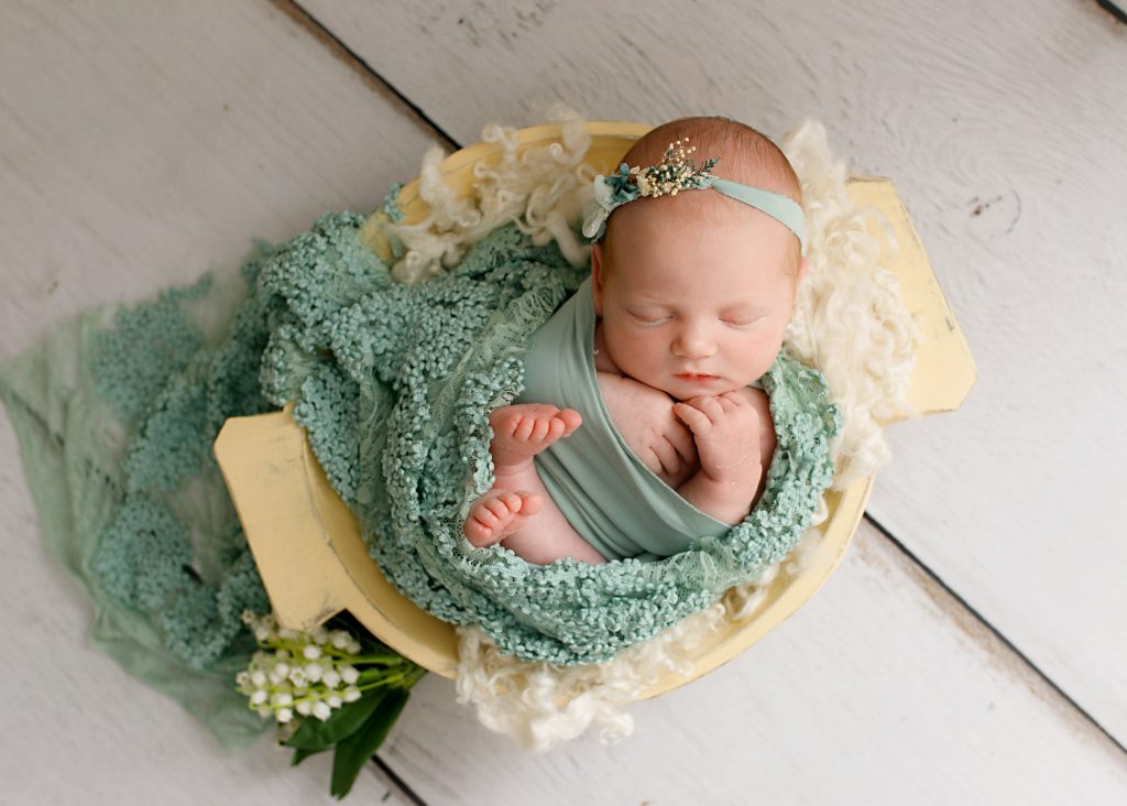 baby girls with green wrap in a bowl photographed in Kent
