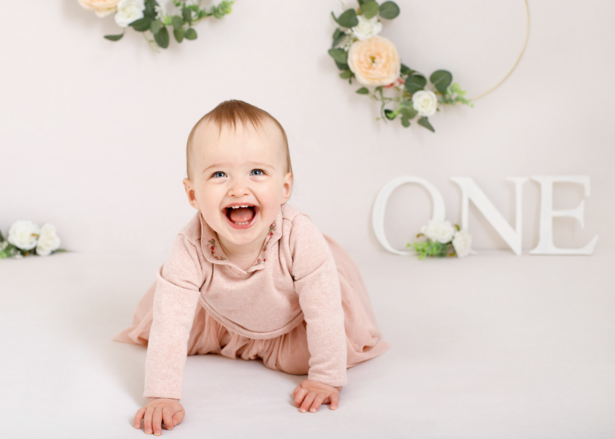 girl smiling for 1st birthday photography session in Kent