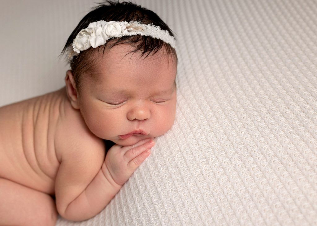 baby girl with rolls photographed in Kent studio